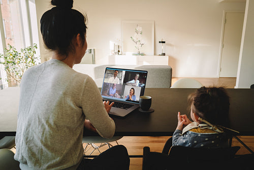 Businesswoman having a video conference call from home