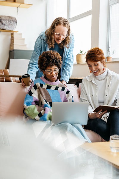 Colleagues collaborating in a modern freelance office space