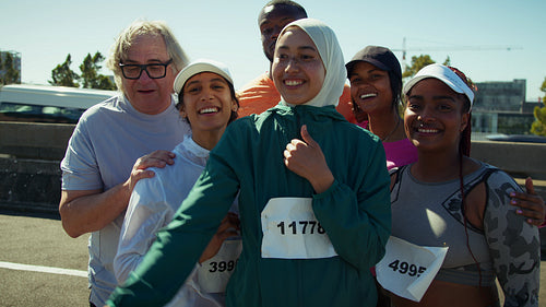 Happy runners capture a group selfie