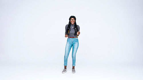 Smiling african female with long dreadlocks