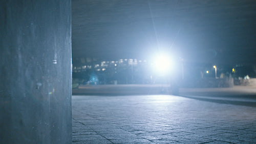 Group of people running in the city at night