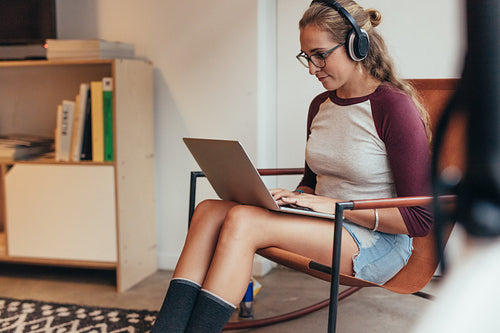 Woman working at software development startup