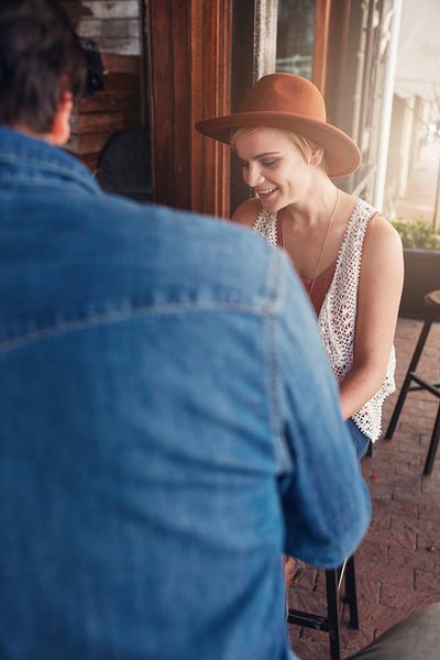 Young woman with her friend at a cafe