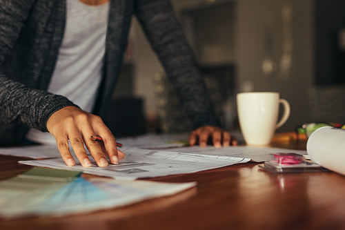 Female designer working on architect project