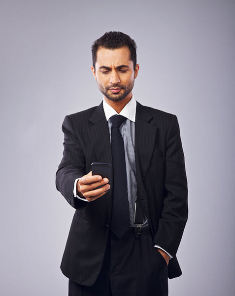 Executive Reading a Text Message
