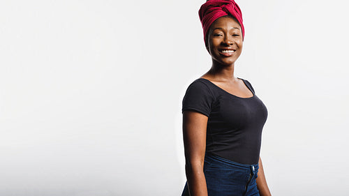 Portrait of smiling african woman in a headwrap