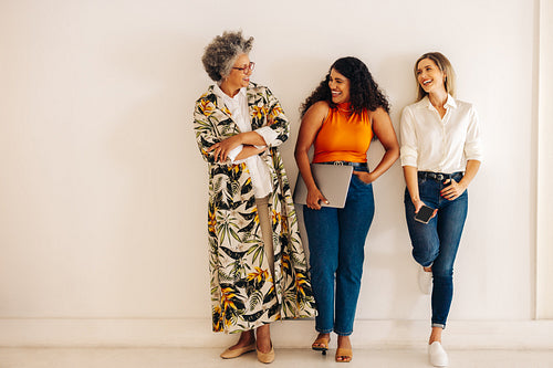 Group of happy businesswomen laughing together