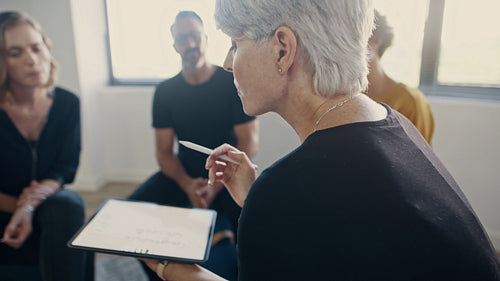 Mentor giving personal development training to employees