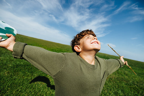 Boy enjoying carefree moment in the sun