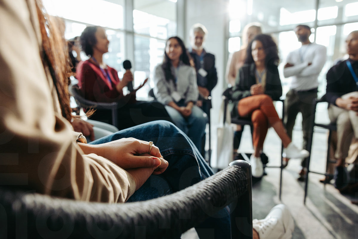 Diverse group in a business meeting discussing ideas and collaborating ...