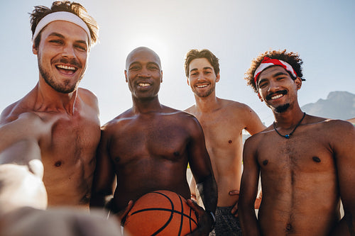 Basketball players posing for photo