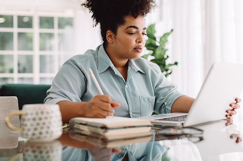 Young businesswoman working from home