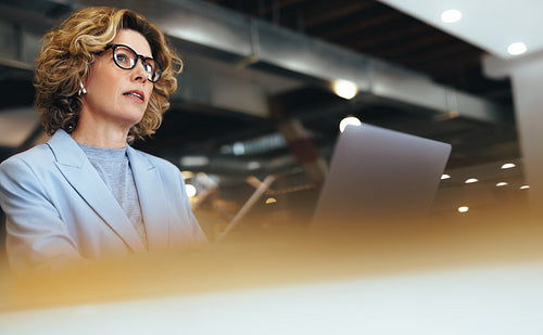 Business woman having an online meeting in a coworking space