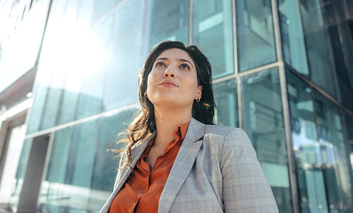 Female entrepreneur looking thoughtful outdoors
