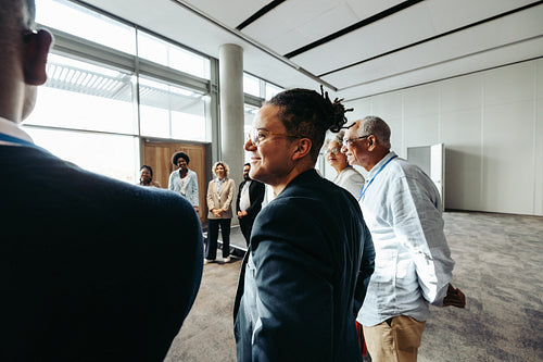 Diverse group of people enjoying a teambuilding workshop with fun exercises