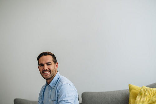 Freelancer in lobby looking at camera