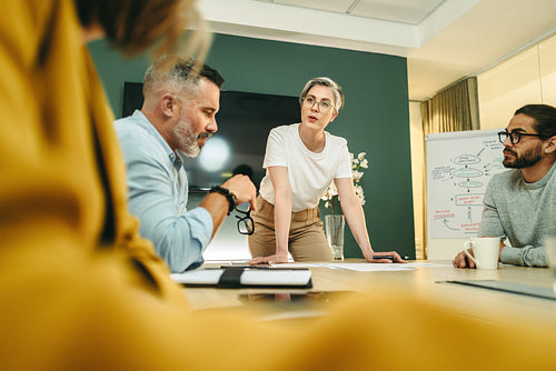 Female entrepreneur leading a meeting in a boardroom