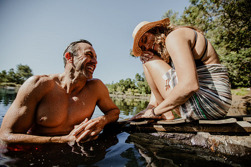 Couple enjoying on their weekend at the lake.