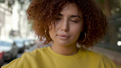 Beautiful young woman smirking