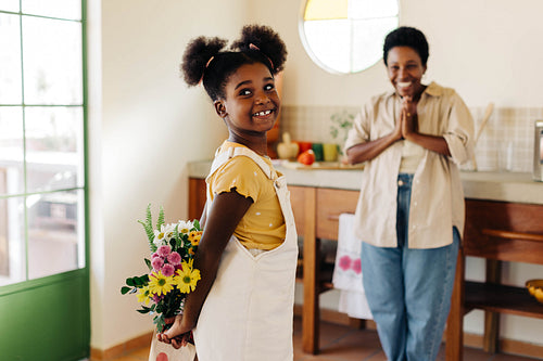 Mother's day surprise: Daughter surprising mom with a floral gift