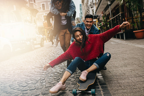 Asian friends having fun outdoors