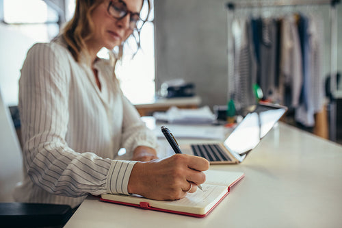 Online business owner working at her desk