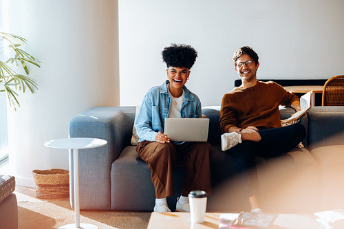 Confident teamwork: Colleagues check progress before next steps
