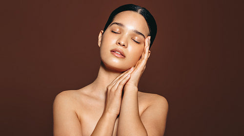 Flawless skin as a result of skincare and self-love: Woman radiating beauty from within