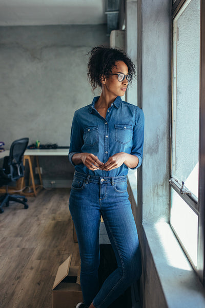 Thoughtful woman entrepreneur