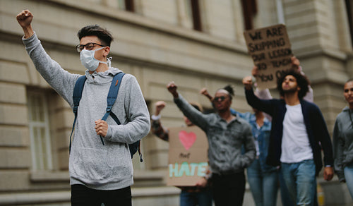 Group of activists protesting on road