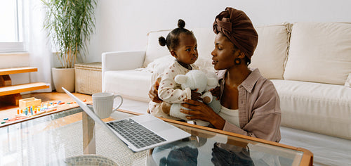 Woman with child in living room