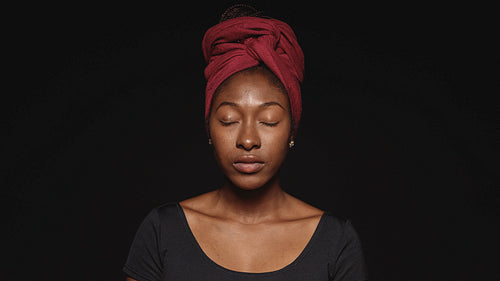 Portrait of african woman in a headwrap