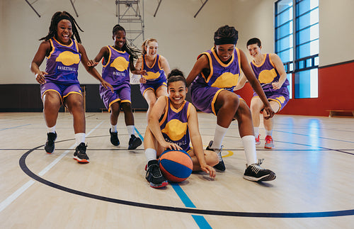Court queens: Female basketball team beams with pride in group photo