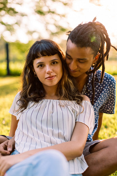 Charming couple being cozy outdoors