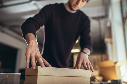 Man preparing a shipment as ordered