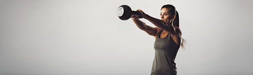 Kettlebell exercising woman