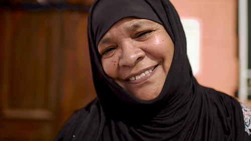 Smiling arabic woman in hijab