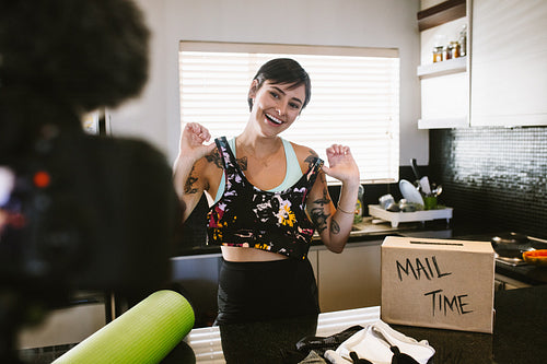 Woman making new sportswear video for vlog