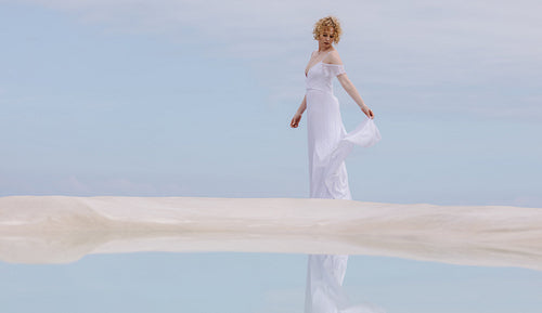 Woman standing at the beach