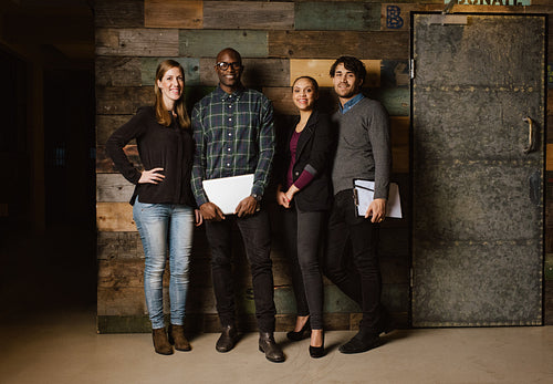 Portrait of successful business team standing in an office