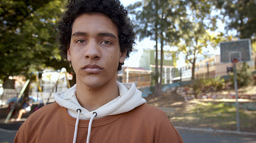 Teenage boy looking at camera and smiling