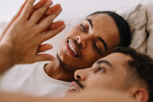 Couple enjoying intimate moment together in bed