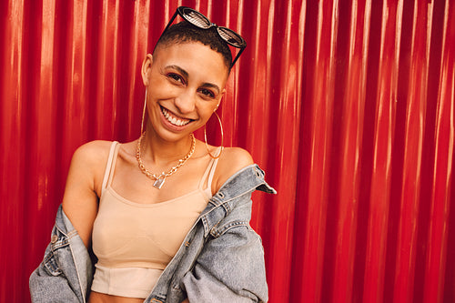 Pretty young woman smiling at the camera