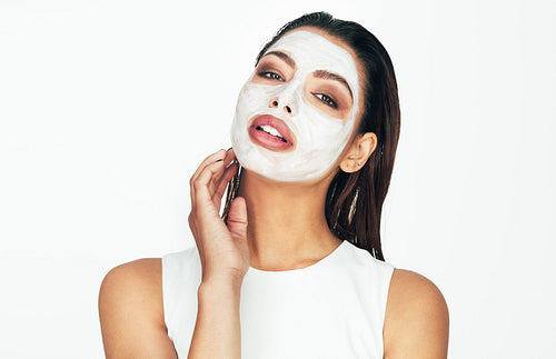 Woman with a cosmetic facial mask