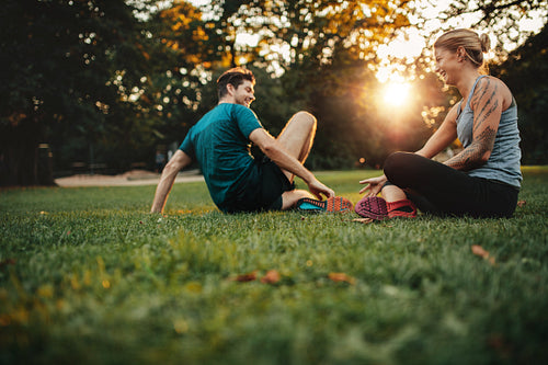 Couple relaxing after physical training session
