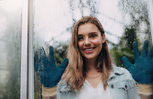 Female gardener at work in plant nursery