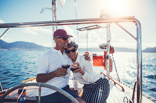 Mature couple enjoying a romantic boat ride