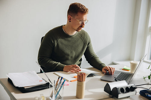 Businessman busy working at his desk
