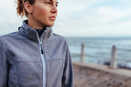 Young woman relaxing after exercise outdoors