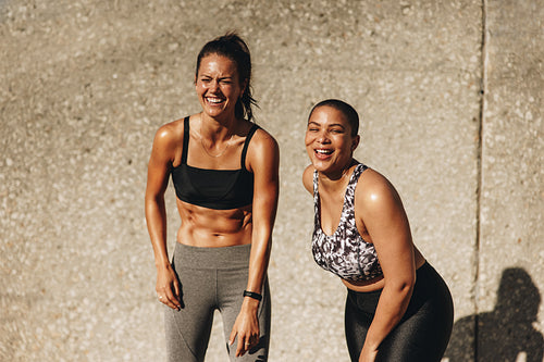 Fitness women smiling after workout session